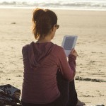 Kindle at the beach. Amazon and book industry